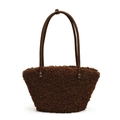 Detail of plush brown shearling tote with leather handles and decorative sphere beads - Coffee