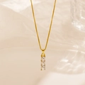 Elegante goldene Titankette mit drei rechteckigen Zirkonias an einer Box-Halskette - Gold