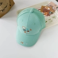 Close-up of kids mesh baseball cap featuring cute whale embroidery and breathable mesh back - One Size / Mint Green