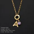 Vergulde roestvrijstalen ketting met textuur letter A en paarse edelsteen hanger - Letter A Stijl (Goud) / Goud