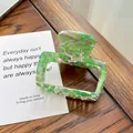 Square acetate hair claw clip with green and purple marble texture on wooden desk - 6.6cm / Grey Green