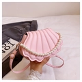 Pink shell-shaped crossbody bag with pearl chain handle and faux leather texture - Pink