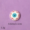 Macro shot of Halloween resin eyeball accessory with red veins and 2.1cm size detail - Blue Iris Eyeball