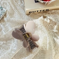 Detail of butterfly hair claw clip with morandi tones on delicate white lace background - Wide Butterfly Clip / Approx. 8cm / Transparent Brown