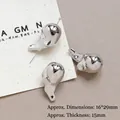 Dettaglio di perle irregolari in resina stile metallo liquido per creazione di gioielli - 15# (16x29mm)