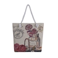 Detailed texture of ethnic canvas bag featuring floral bird embroidery and rope handles - Bird and Vase