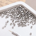 Macro detail of silver square spacer beads for DIY jewelry making on white tray - 3mm White K (10 Pcs)