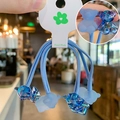 Detailed view of handmade blue gummy bear hair ties with frosted and translucent textures - 2-Piece Set / Blue