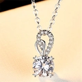 Silver-plated necklace featuring a round brilliant-cut solitaire diamond pendant - Xl-54 (with Cross Chain)