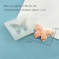 Stampo in silicone a farfalla per fondente e cioccolato con rilievo floreale rosa - Chiaro