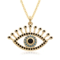 Golden Evil Eye pendant necklace with blue and black bead inlay on a white background - Evil Eye Disc Style (F175)