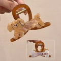 Brown acrylic dog hair claw clip with pearlescent finish and bone detail on the back - Dog + Khaki Clip