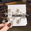 Pinza para el pelo de estrella dorada con pedrería blanca brillante en clip de pato - Dorado