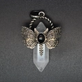 Macro detail of vintage dragonfly pendant with hexagonal crystal and black stone inlay - White Crystal
