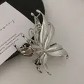 Polished silver liquid metal butterfly hair claw clip with cutout wing design - Hollow Butterfly / Silver