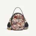 Blue crossbody bag featuring teddy bear tapestry patterns and wide logo canvas strap - Blue
