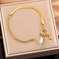 Gold stainless steel AB chain bracelet with pearl and star charms in a jewelry box - White Rhinestone Bar