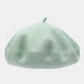 Detail shot of mint green wool felt beret showing thick fiber texture and top stem - One Size / Mint Green