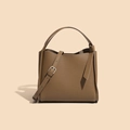 Minimalist brown leather bucket bag with top handle and adjustable metallic strap - Dark Brown