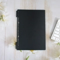 A5 black matte loose-leaf notebook with metal spiral binding on white wooden background - B5-26 Holes / Black - (2 Pieces Including Clips)