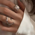 Modern liquid silver moonstone ring set with iridescent mother of pearl on silk sleeve - Iridescent Irregular Pearl Liquid Metal Set
