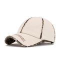 Distressed cream baseball cap featuring leopard print accents and embroidered lettering - Beige