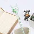 Transparent light green sequin gel pen featuring daisy pattern and deer horn topper - Green Deer Daisy