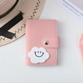 Pink PU leather 26-slot card holder with cute white cloud smiley and snap closure - Cloud