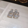 Macro shot of silver geometric earrings with full rhinestones in a white jewelry box - 12# Silver Needle-Silver-Full Diamond Square Teardrop