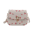 Chic white crossbody bag with red cherry prints and golden metallic clasp closure - White
