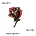 Elegante spilla a rosa con strass rossi e misure 6,2 cm per 3,8 cm - Rosso
