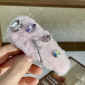 Detail of pink faux fur hair clip with sparkling rhinestones and a silver love charm - Hair Clip / Pink Rhinestone BB Clip