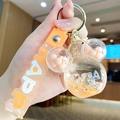 Orange Mickey-shaped keychain with floating glitters and Happy lettered silicone strap - Mickey Head Bubble Bead - Orange
