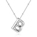 Detailed macro shot of balloon style letter B pendant on a silver stainless steel necklace - B-Steel