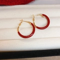 Golden C-shaped hoop earrings with red enamel inlay presented on a beige jewelry tray - Gold Red C-Shaped Hoop (45# Silver Pin)
