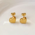 Detail view showing polished 18K gold-plated heart stud earrings with butterfly backings - Stud Earrings / Gold