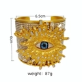 Detail view of evil eye rhinestone cuff bracelet showing 6.5cm width and 87g product weight - Blue Eye