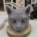 Spooky grey three-eyed Sphynx cat scented candle on a wood slice for Halloween decor - 8*8*8CM Box / Gray