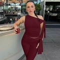 Detail of burgundy one-shoulder ribbed knit top and matching slim trousers set - S / Burgundy