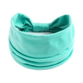 Dettaglio della fascia elastica per yoga verde menta con trama a maglia e nodo a pieghe - Ciano