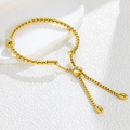 Vintage twisted gold titanium bracelet with sparkling zircon ring and adjustable slider - Zircon Cable Bracelet / Gold