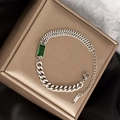Bracciale a doppia catena argentato con gemma verde smeraldo su tessuto in raso bronzo - Bracciale / Argento