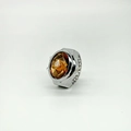 Vintage style silver ring watch featuring a faceted amber gemstone lid and elastic band - Brown