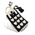 Close-up of knitted phone bag with heart pattern and removable black shoulder strap - Heart Black White