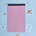 Pink horizontal lined legal notepad with black top binding on a blue decorative background - A5 / Pink