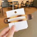 Minimalist amber gradient large hair clip on display card with elegant translucent resin finish - Tortoise