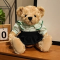 Hellbrauner Teddybär im grün gestreiften Hemd und schwarzem Faltenrock Plüschtier - Grün gestreifter Anzug - Weiblich