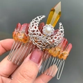 Close-up of handmade silver moon hair comb featuring natural red and yellow crystals - Hair Comb / Yellow Orange