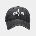 Detail of the BELIEVE letter print and cross graphic on a vintage grey baseball cap - Black