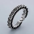 Men's punk braided leather bracelet with silver dragon embossed stainless steel charm - Dragon Relief Style (KB94375-BD)